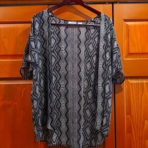 Sweet cover to snazz up your outfit.  Size S/M